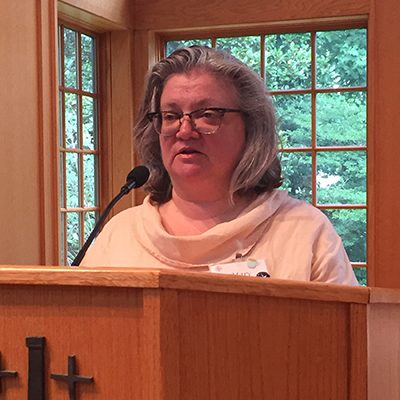parishioner Mary Hinkle at pulpit